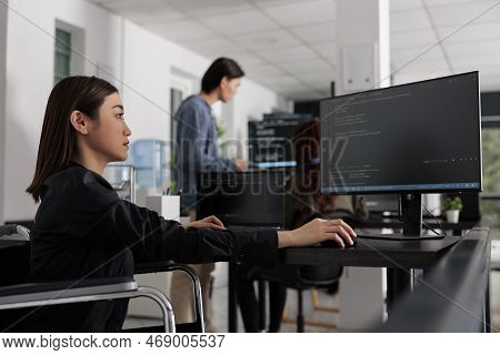 Web Developer In Wheelchair Working On Server Coding In Big Data Office, Analyzing Programming Langu