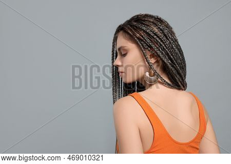 Beautiful Woman With Long African Braids On Grey Background, Space For Text