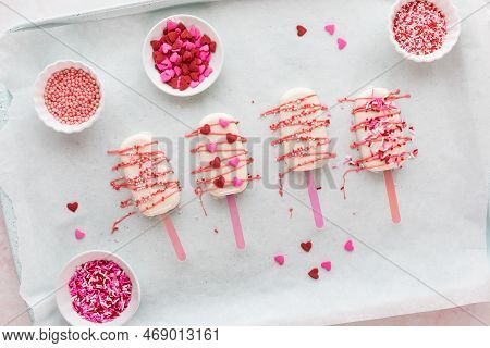 Homemade Cakesicles Drizzled With Candy Melts And Decorated With Sprinkles.