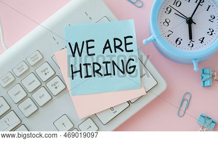 We Are Hiring Written White Note Paper On Bink Background, Recruitment Concept