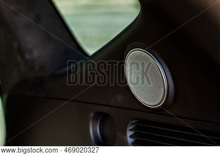 Sound Speaker In A Modern Car Trunk. Close Up Car Speaker Inside Car Door.