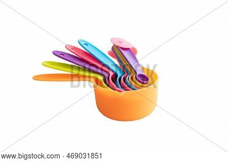 Measuring Spoons, Colorful Measuring Spoons For Use During Cooking In The Kitchen, Isolated On A Whi