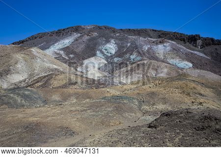 Scenic Road Artists Drive In Death Valley To Artists Palette, Arount Stones,hills With Colorful Mine