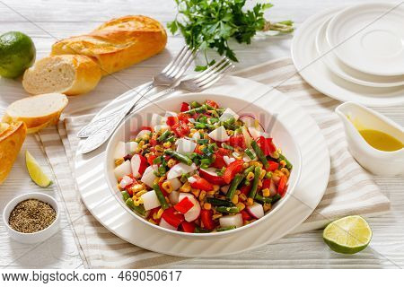 Charred Corn, Radish, Jicama, Red Pepper And Green Bean Vegan Salad With Lime Olive Oil Dressing In 