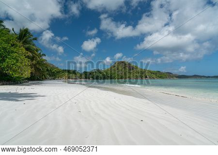 View Along The Long Beach Of Anse Volbert On The Seychelles.