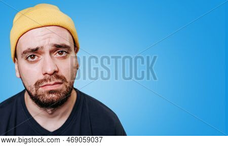 A Photo Of A Tired, Exhausted And Unhealthy Looking Man, With An Unhappy Expression, In A Studio Sho