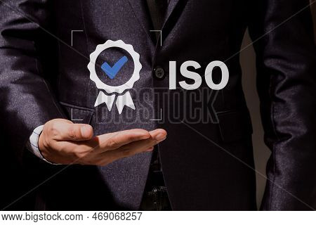Businessman Showing Iso On Open Hand Sign Top Service Quality Assurance Management System, Guarantee
