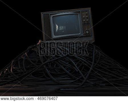 A Vintage 80's Television Perched On A Jumbled Pile Of Black Cables On A Dark Omnious Background - 3