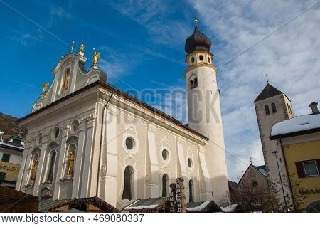 San Candido, Italy - December 29, 2022: View Of The Church Of St. Michael During Christmas Time In T