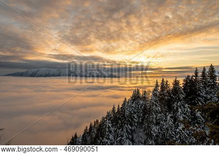 Landscape From Top Of Postavaru Mountain At Sunset, Bucegi Mountain In Background, Poiana Brasov, Ro