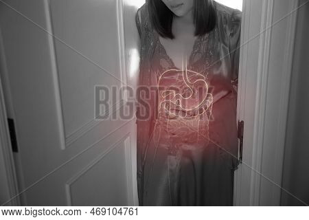 Asian Woman Touching Stomach Painful Suffering From Enteritis At Night.