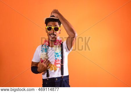 Carnival Outfit Party. Portrait Of Black Man With Carnival Props Having Fun