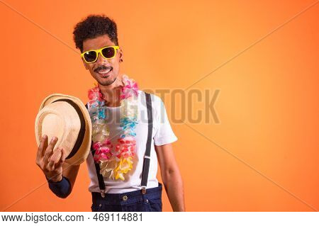 Carnival Outfit Party. Portrait Of Black Man With Carnival Props Having Fun