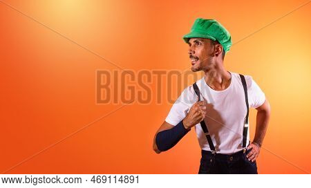 Carnival Outfit Party. Portrait Of Black Man With Carnival Props Having Fun