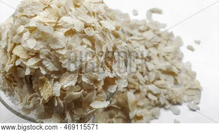 Flattened Rice, Beaten Rice, Chivda Or Poha Close-up Macro Shot Isolated On White Background