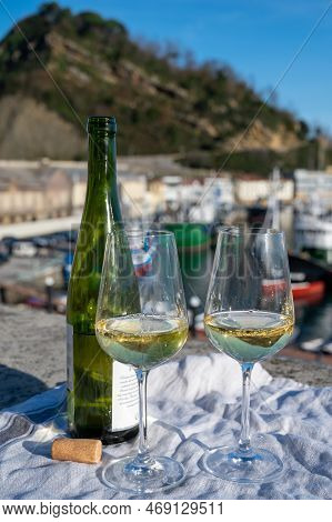 Tasting Of Txakoli Or Chacolí Slightly Sparkling Very Dry White Wine Produced In Spanish Basque Coun