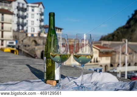 Tasting Of Txakoli Or Chacolí Slightly Sparkling Very Dry White Wine Produced In Spanish Basque Coun