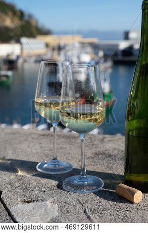 Tasting Of Txakoli Or Chacolí Slightly Sparkling Very Dry White Wine Produced In Spanish Basque Coun