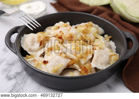 Cooked Dumplings (varenyky) With Tasty Filling And Fried Onions On White Marble Table, Closeup