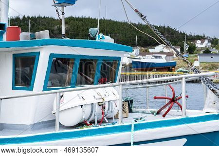 Whiteway Newfoundland Canada, September 25 2022: Fishing Boat With Anchor On Deck Moored At A Dock A