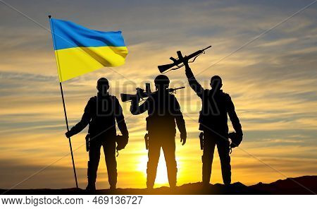 Silhouettes Of Soldiers With Ukraine Flag Against The Sunset. Armed Forces Of Ukraine Concept. Eps10