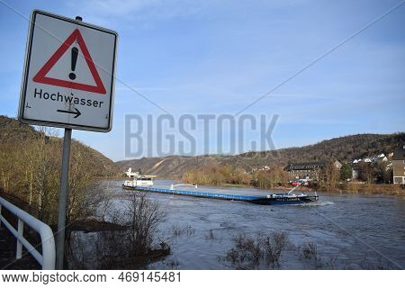 Lehmen, Germany - 01 18 2023: Cargo Ship Still Running In The Mosel Flood
