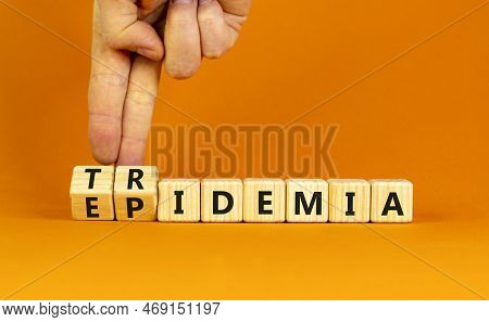 Covid-19 Epidemic Or Tridemic Symbol. Concept Word Epidemic And Tridemic On Wooden Cubes. Doctor Han