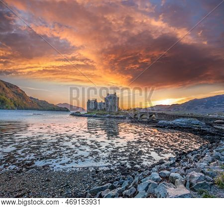 Colorful Sunset Against Eilean Donan Castle At Kyle Of Lochalsh In The Western Highlands Of Scotland
