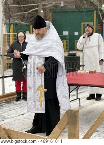 Moscow, Russia - January 18, 2023: Ritual Of Consecrating Water On The Lake On The Day Of Baptism. P