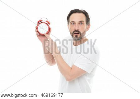 Man Pointing Finger On Alarm Clock At Background. Photo Of Man With Alarm Clock.