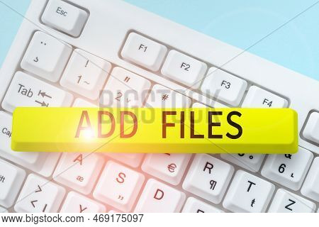 Hand Writing Sign Add Files. Concept Meaning To Put More Information To A Certain Person, Thing, Or 