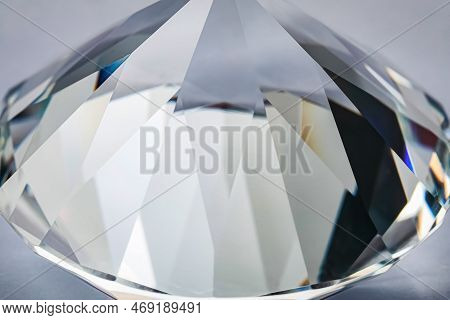Beautiful Dazzling Diamond On Light Grey Background, Closeup. Precious Gemstone