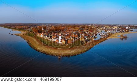 Urk Flevoland Netherlands Sunset At The Lighthouse And Harbor Of Urk Holland. Fishing Village Urk