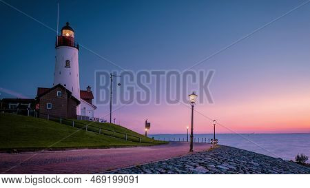 Urk Flevoland Netherlands Sunset At The Lighthouse And Harbor Of Urk Holland. Fishing Village Urk