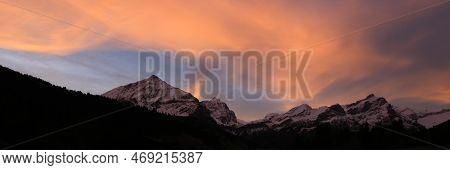 Bright Lit Clouds Over Mountains Near Gstaad, Switzerland.