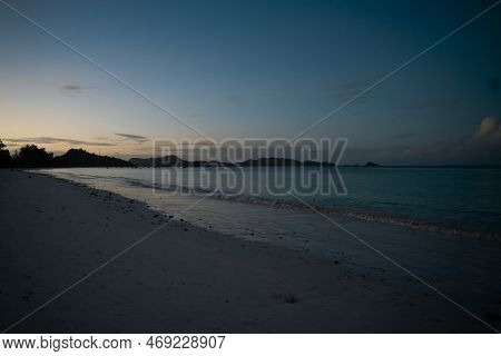 View Along The Long Beach Of Anse Volbert In The Evening.