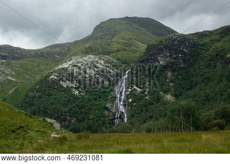 Close View Of Steall Waterfall Cascades, Located In Scotland Highlands, Scotland, Uk