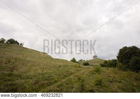 Pidkamin Inselberg Stone On Hill Landscape. Ukraine.