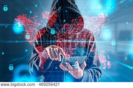 Mysterious Businessman In Casual Wear Typing On Tablet Device Watching At Digital Interface With Red