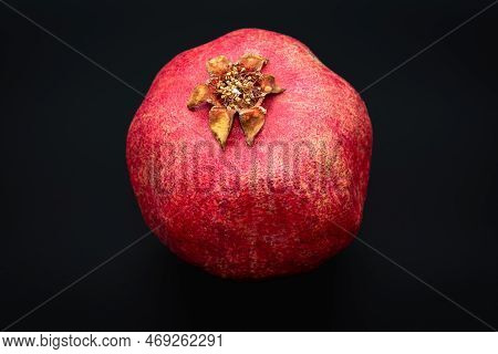 Close-up Photo Of Pomegranate On Black Background, Detailed Image Of Pomegranate Fruit