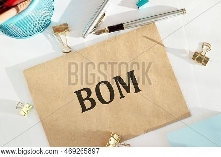 Bom - Bill Of Materials Acronym On Notepad, Business Concept Background