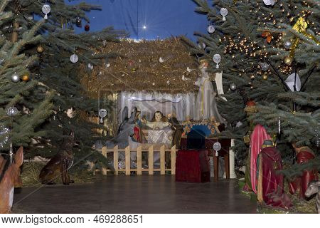 Christmas Nativity Scene. Figures Of The Blessed Virgin Mary, Saint Joseph, Baby Jesus. Photo In Ost