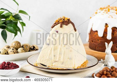 Traditional Cottage Cheese Easter Paskha And Eggs On White Table. Russian Paskha. Easter Dessert. Ea
