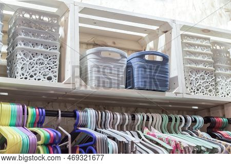 Wardrobe Storage. Organization Of Home Space And Order In The House. Storage Boxes And Clothes Hange