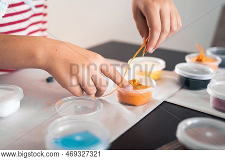 Little Girls Sculpt Figurines Crafts From Air Plasticine, Modeling Dough.online Lessons In Tablet. C