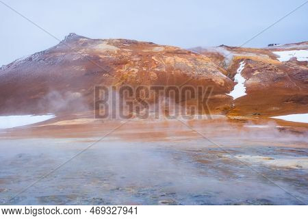 Geothermal Area In Iceland, Pure Green Energy At Sulfur Valley With Smoking Fumaroles. Famous Touris