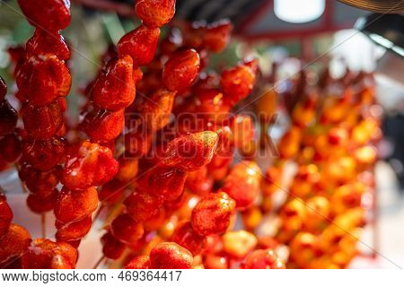 Tanghulu Traditional Chinese Hard Caramel Coated Strawberry Skewers Close-up Also Called Bing Tanghu