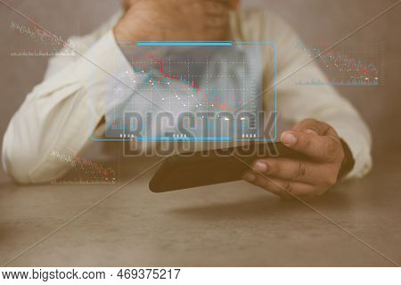 Stress Man Use Phone With Concerned About The Decline In The Value Of Financial Market, Chart Graphi