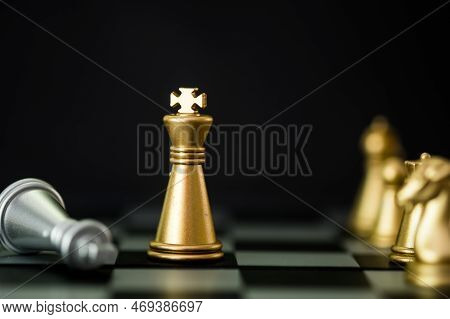 Stand Of Golden King Chess And Fallen Silver King Chess. Winner Of Business Competition And Marketin