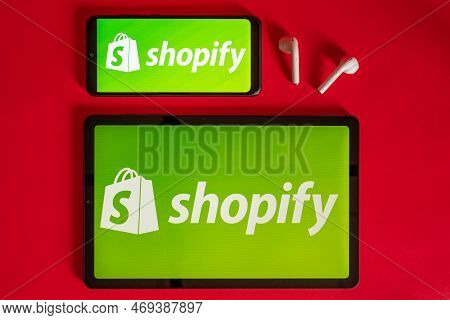Tokio, Japan - June 05, 2022: Shopify Web Page Displayed On A Modern Laptop, Smartphone And Notebook
